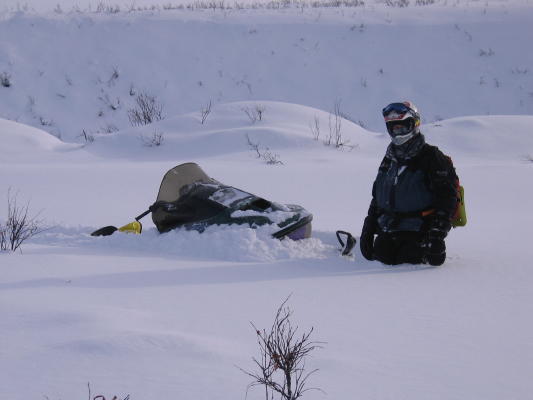 The snow was deep and we stuck our snowmachines many times.